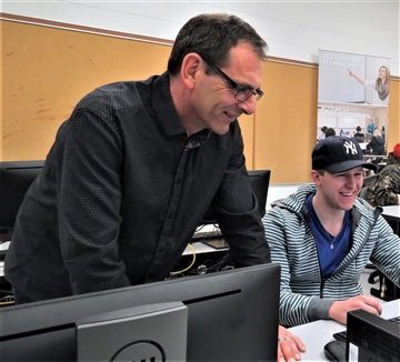 Allan Robertson and Eli Instructor and Student