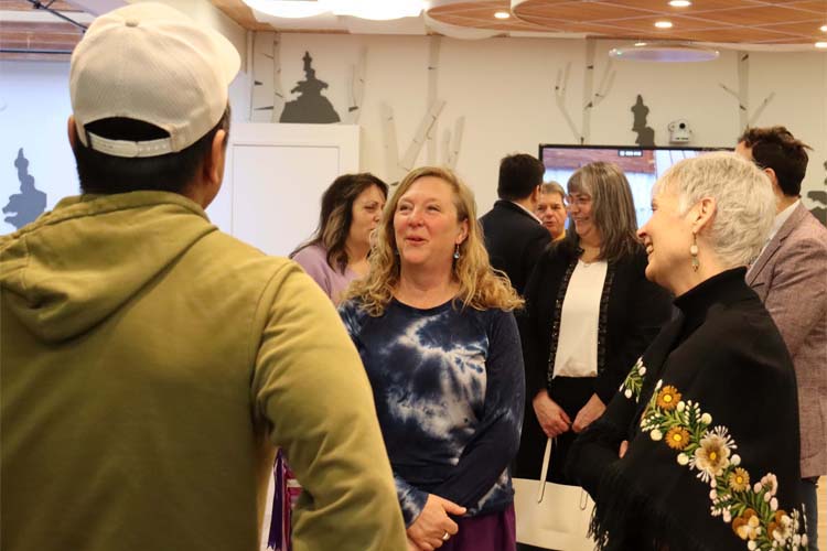 Portage College President Nancy Broadbent and Bev Moghrabi, the vice-president of College and Student Services, chat with guests at the recent Pipe Ceremony.