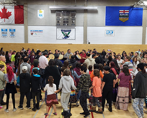 500 students from Lac La Biche schools, alongside Portage College staff, faculty, and students, joined in the enriching Educational Round Dance on March 7th