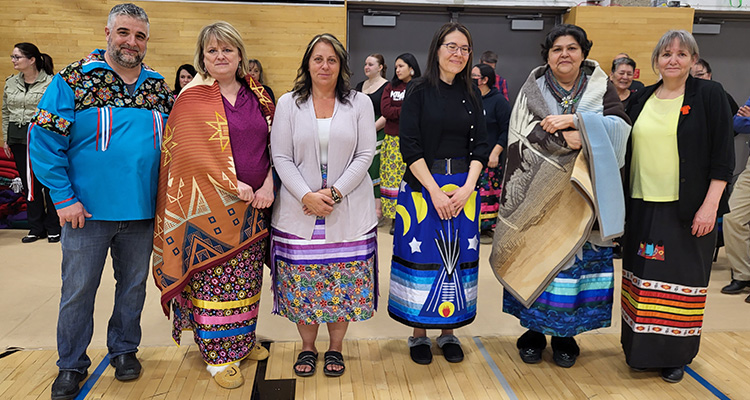 Carrie Froehler and Shelley Jackson were honoured for their commitment to “reconcili-action” at a Blanket Ceremony during the educational Round Dance.
