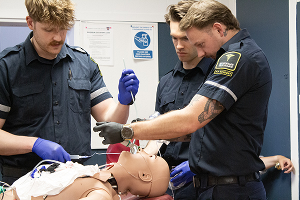 Portage College ACP students work inside the Colinton community hall during one of their mock scenarios. 