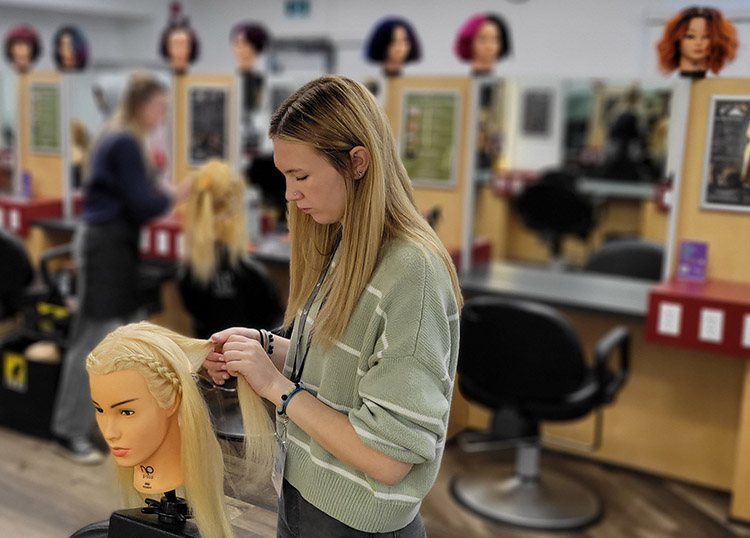 Students in the Skills Canada Hairstyling competition worked in the hair salon at Portage College in Lac La Biche.