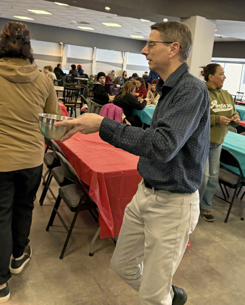 DavidPaulBusyEasterdinnerVolunteer - Portage College